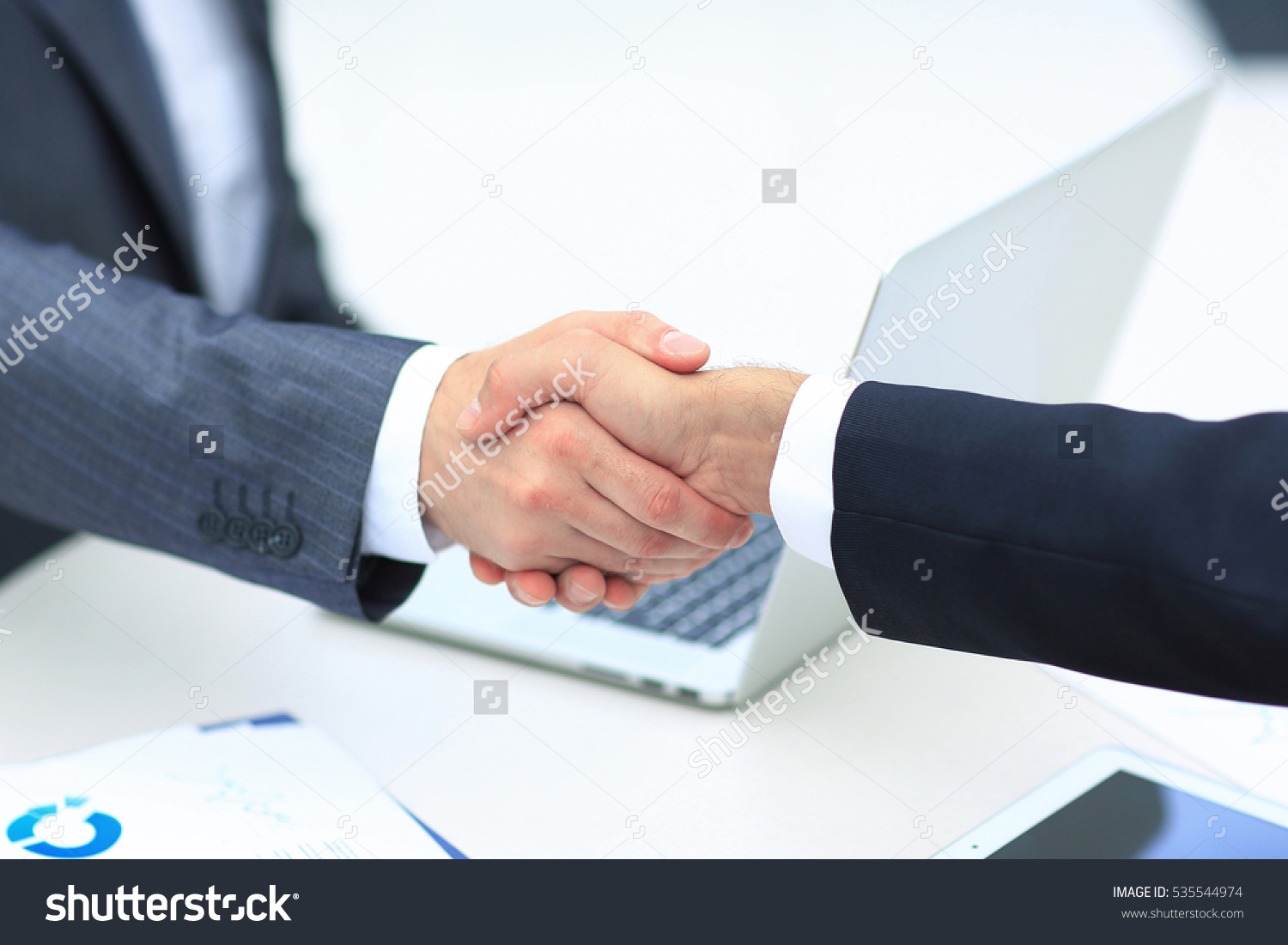 stock photo business people shaking hands 535544974 1